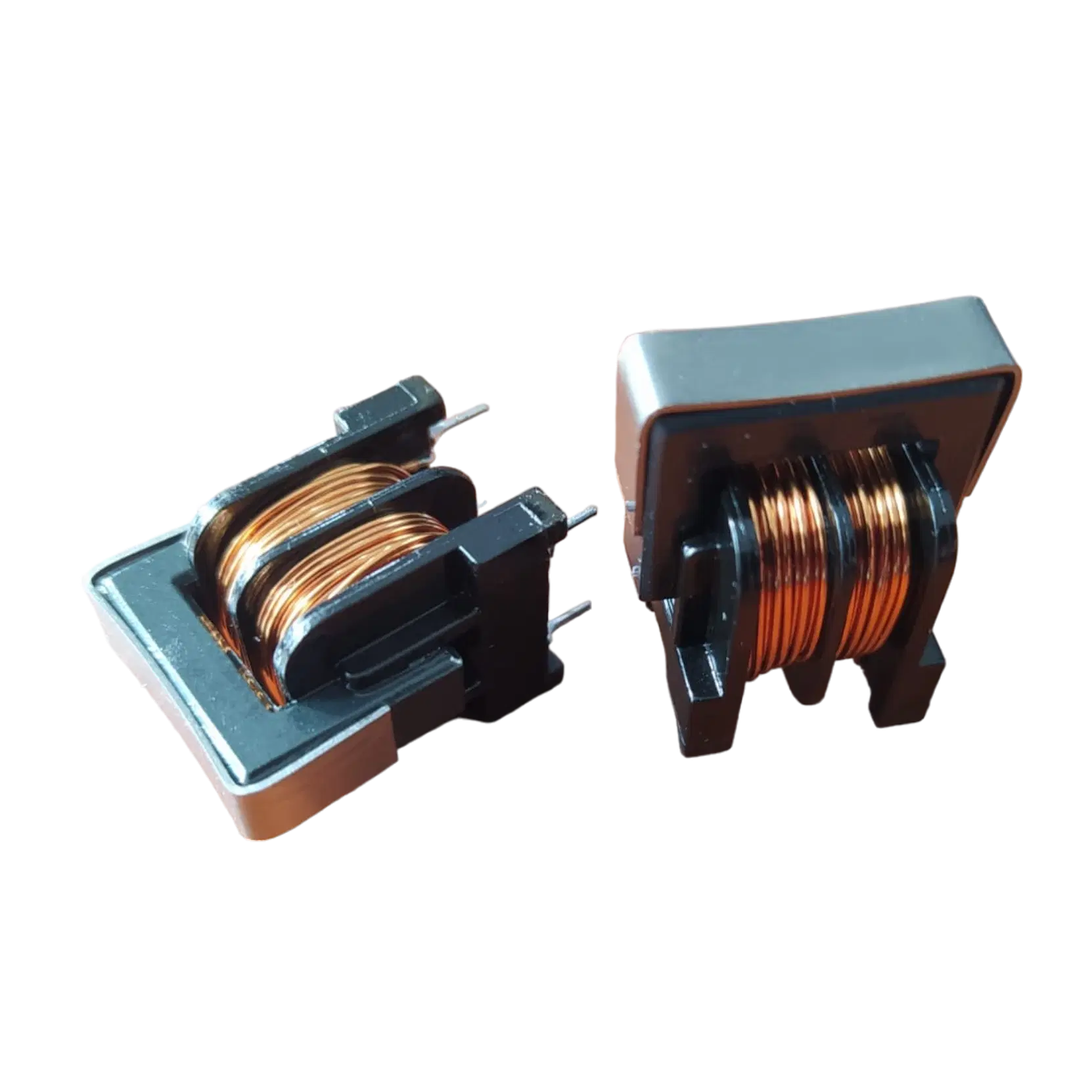 Two PCB-mount line filter chokes, copper windings on a bobbin inside a clamped core